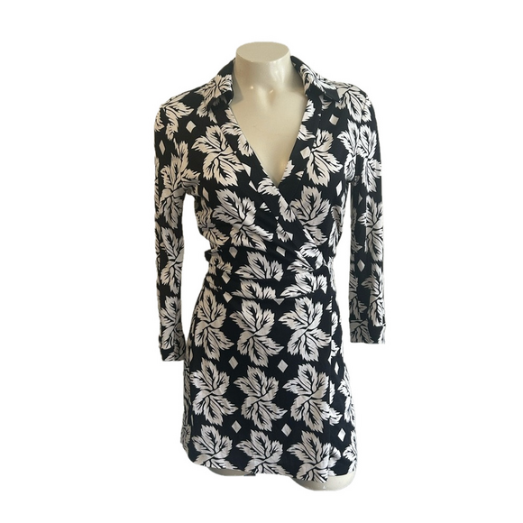Diane Von Furstenberg Other - DVF Celeste black / white floral 100% silk belted Romper Sz 4